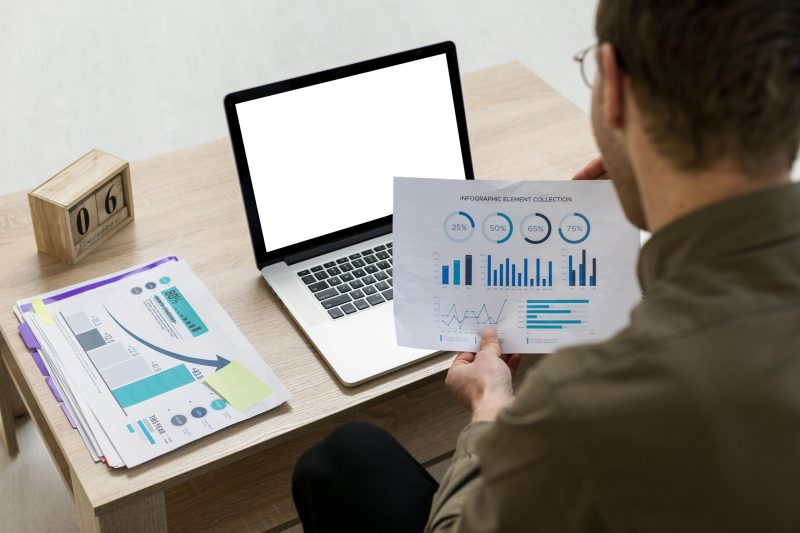 man-working-with-infographics-indoors-scaled.jpg
